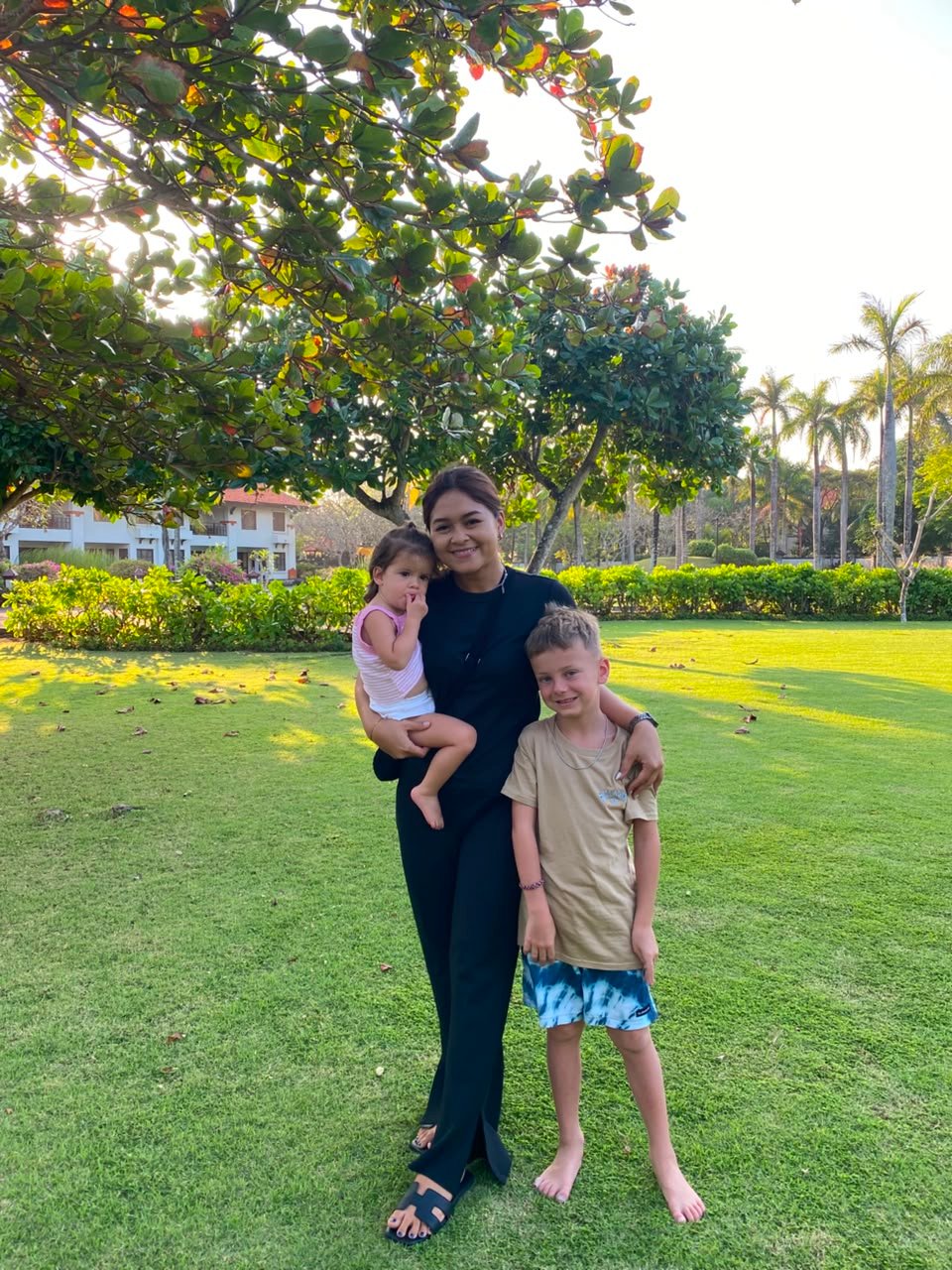Baby sitter playing with kids in Bali
